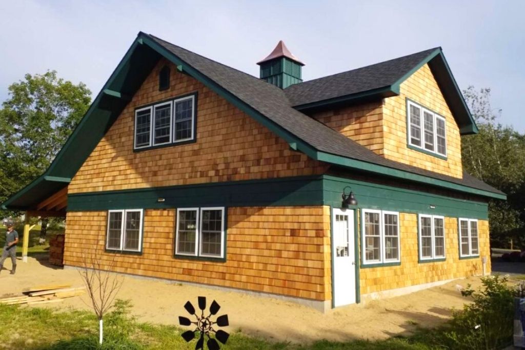 Two tone color scheme garage with two stories Large garage with two tone color scheme
