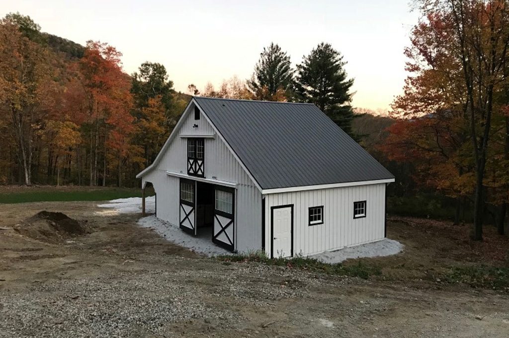 Small white barn in the fall