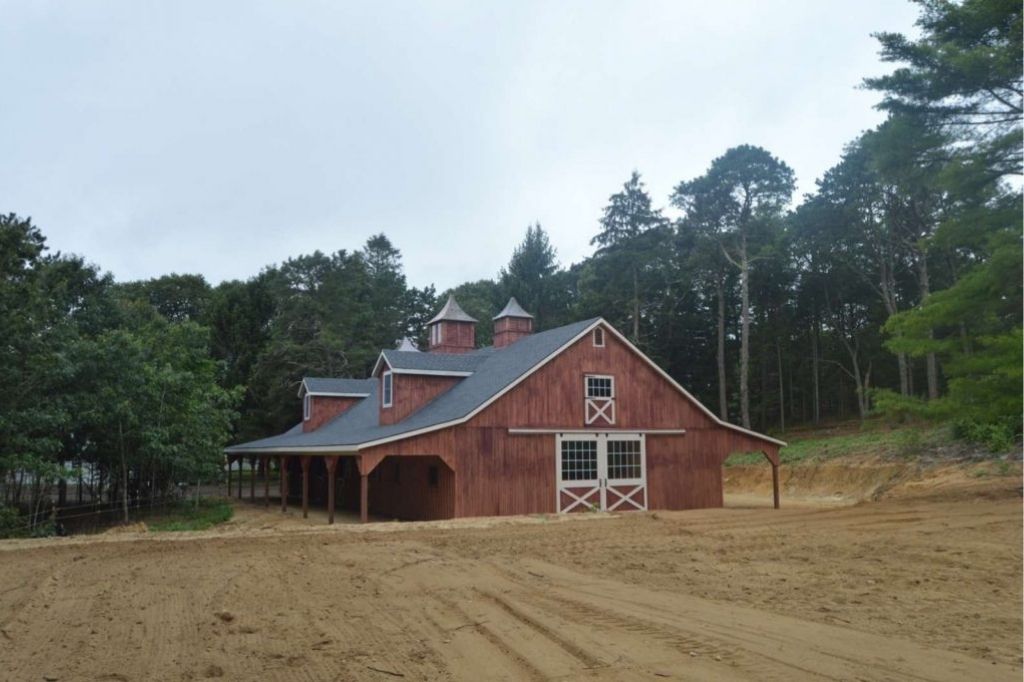 Equine barn with rustic design